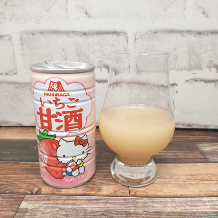「森永乳業 いちご甘酒」とテイスティンググラスの画像
