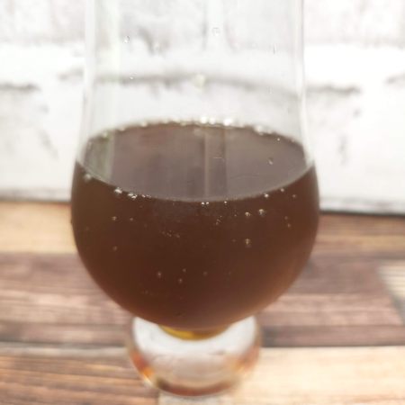 「泰山 仙草蜜」の飲料部分も黒茶系色