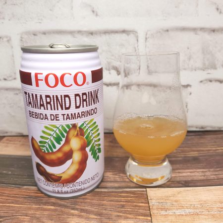 「FOCO タマリンドジュース」とテイスティンググラスの画像