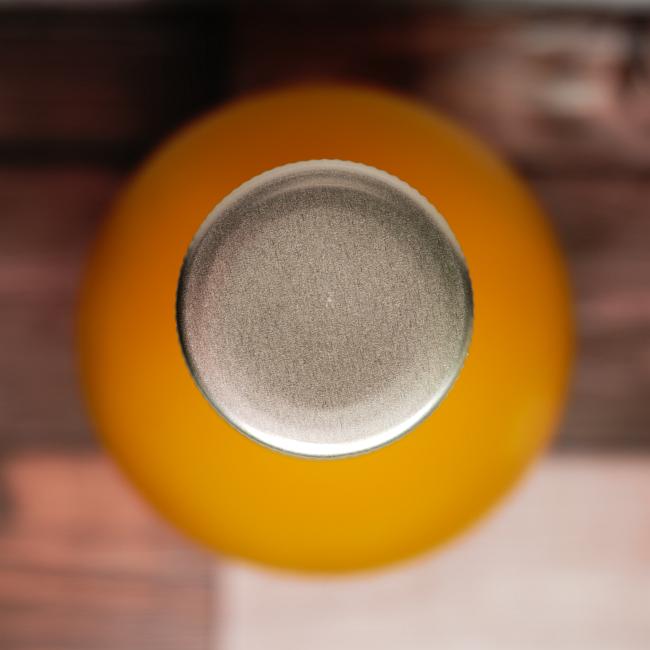 「宮崎果汁 マンゴードリンク(果汁50％)」のキャップ画像(写真)