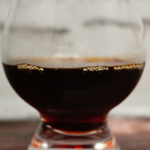 「Ｗ coffee ブラック」をテイスティンググラスに注いだ画像