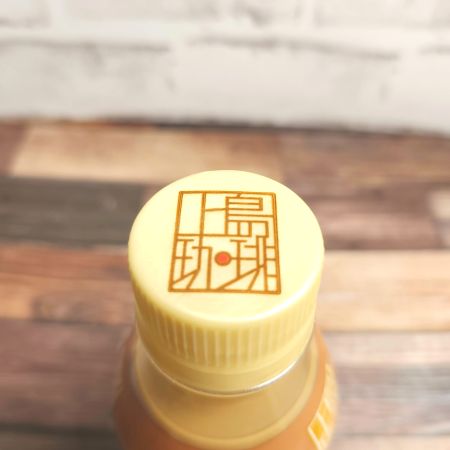 「UCC 上島珈琲店 黒糖入りミルク珈琲ペットボトル」のキャップ画像