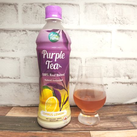 「Asia Farm Purple Tea(パープルティー)」とテイスティンググラスの画像